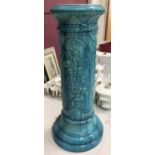 Burmantofts turquoise glazed jardinière stand with floral decoration