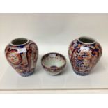 Pair of 19th century Imari vases together with small Japanese bowl of Imari colours