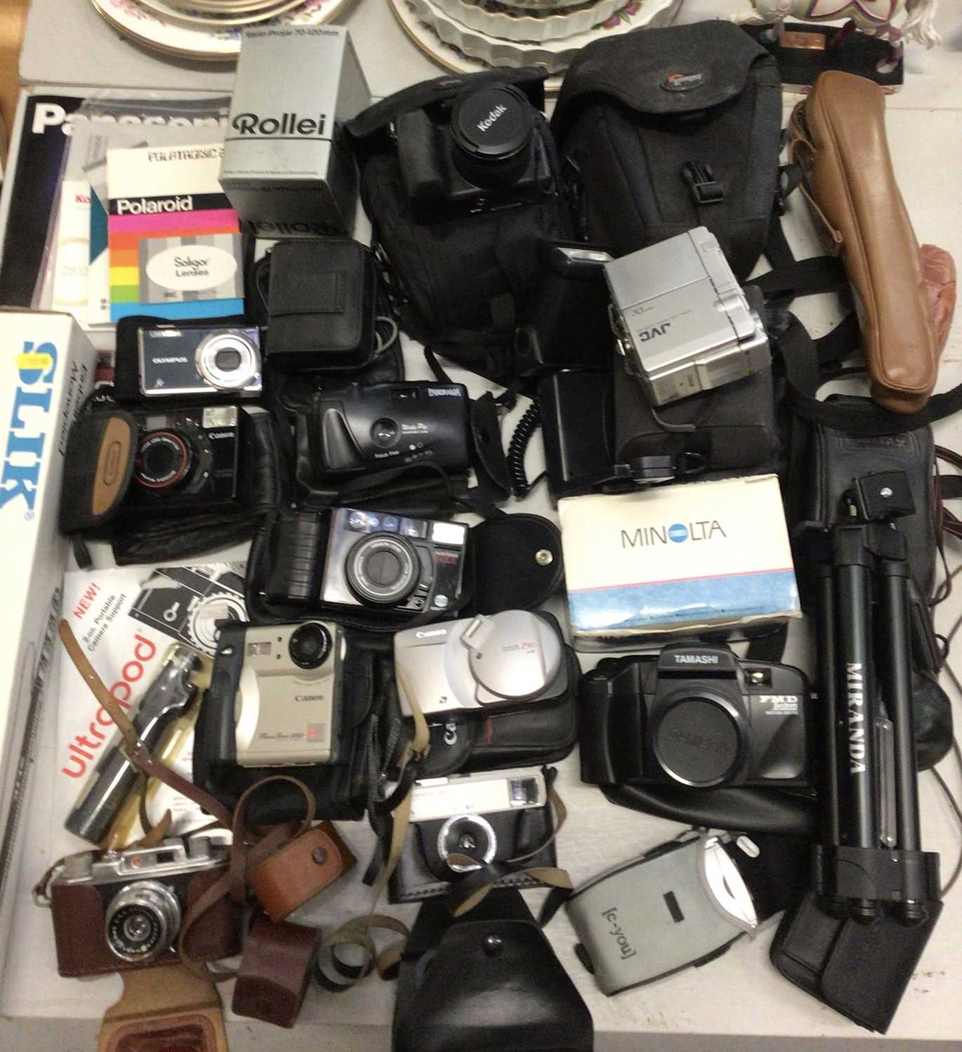 Group of digital and other cameras including Kodak, Minolta, Olympus etc tripods and accessories