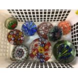 Nine assorted glass paperweights