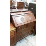 Oriental hardwood bureau with fitted interior, two short and two long drawers below, 91cm wide, 42cm