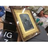 Victorian overpainted photograph of a woman in glazed gilt frame.