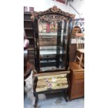 Black lacquered and floral painted two height standing display cabinet