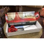 Ceramic poppy from the Tower of London First World War display, boxed