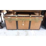 Large brass bound trunk, 120cm wide, 56cm deep, 54cm high, together with a dome top trunk (2)