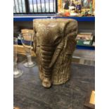 A ceramic stool modelled as an elephant, 44cm high