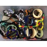 Box of contemporary costume jewellery including bead necklaces and bangles