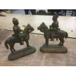 Pair of metal door stops in the form of Military officers on horseback (2)