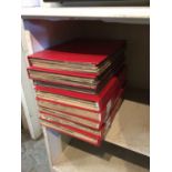 8 folders containing bound copies of Look and Learn magazine