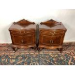 Pair of Continental mahogany bedside cupboards of serpentine outline raised on cabriole legs, 61cm w