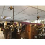 Pair of brass four branch ceiling lights