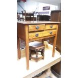 19th century mahogany low boy with crossbanded top above an arrangement of three drawers