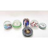 Six Murano art glass paperweights