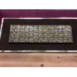 Brass wall sculpture by Giovanni Schoeman, framed