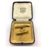 Victorian 9ct gold pink stone and seed pearl bar brooch, together with 9ct gold 'Baby' brooch (2)