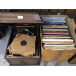 HMV gramophone together with a group of LP records, singles and video discs