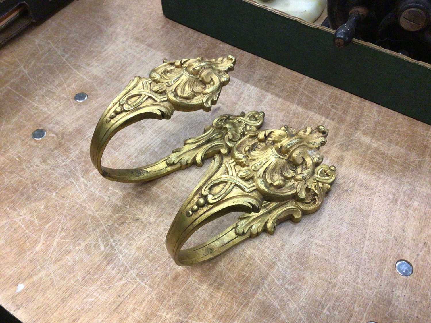 A pair of antique French ormolu tie backs, stamped marks to back, 18.5cm long