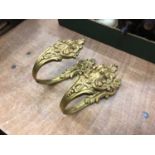 A pair of antique French ormolu tie backs, stamped marks to back, 18.5cm long