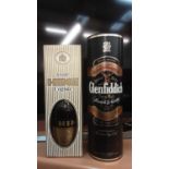 Glenfiddich Special Reserve Pure Malt Whisky, together with Hine V.S.O.P. Cognac, both in original b