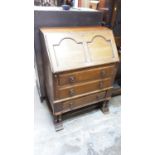 1930's oak bureau with three drawers, 75cm wide, 47cm deep, 104cm high