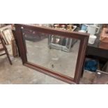 Large rosewood framed mirror.