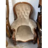 Victorian mahogany framed buttoned back easy chair on turned legs