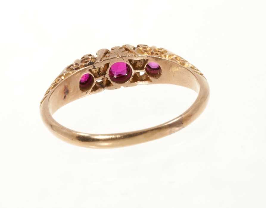 Victorian ruby and diamond ring with three round mixed cut rubies and four old cut diamonds in carve - Image 3 of 3