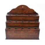 George III tiered oak spoon rack with fifteen apertures and a shaped top on a plinth base