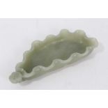 Chinese carved celadon jade brush washer in the form of a poppy leaf, with relief foliage to undersi