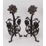 Pair of Arts and Crafts wrought iron fire dogs
