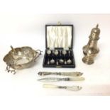 Group of silver items to include a Victorian silver bon bon dish, sugar caster, and other items