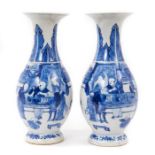A pair of 19th century Chinese blue and white porcelain vases, of baluster form, each painted with a