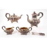 A Victorian silver tea and coffee service and sugar tongs