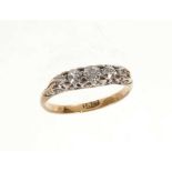 Late Victorian diamond five stone ring with five graduated old cut diamonds in carved gold setting o