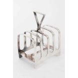 Contemporary silver four division toast rack of hooped form, with central handle (Sheffield 1961) Ja