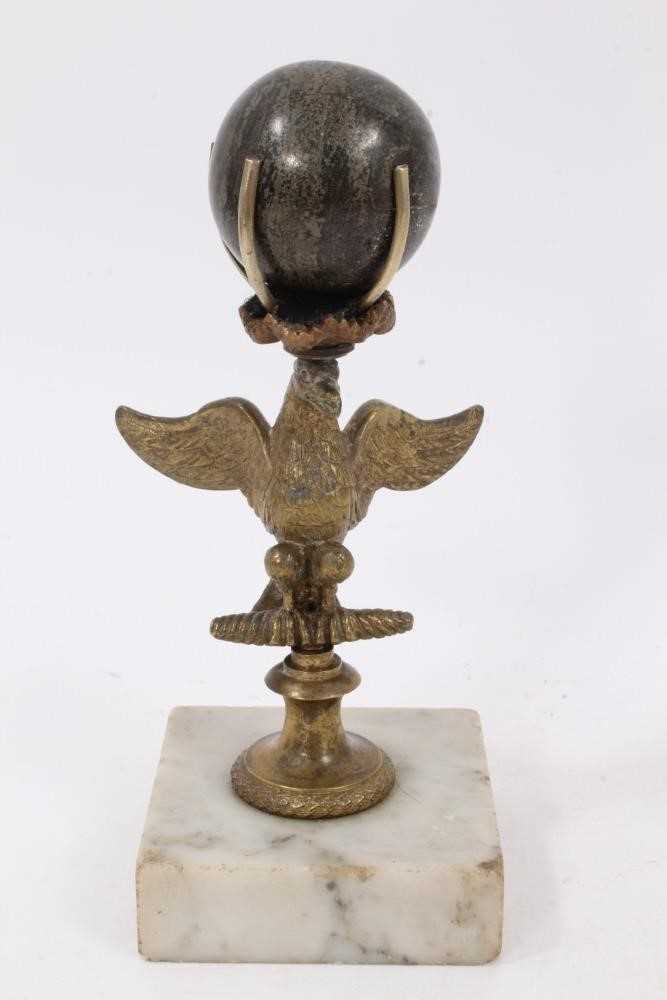 19th century Italian Grand Tour desk stand, an eagle with a pyrite sphere finial held by four claws,