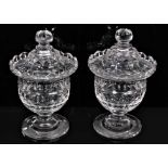 A pair of 19th century cut glass sweet meats/bonbonnieres and covers, with wavy rims, diamond, facet