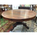 19th century mahogany dining table in the Biedermeier style