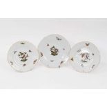 A pair of Herend porcelain dishes, 15.5cm diameter, and anothe measuring 17cm diameter (3)