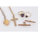Group of gold jewellery to include two T-bars, cross pendant on chain, locket on chain and two rings