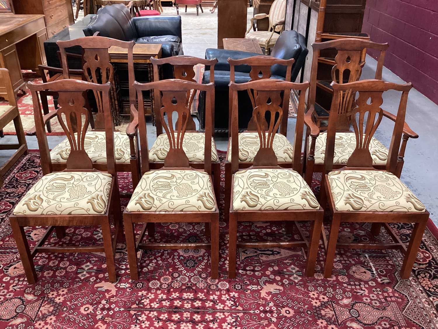 Set of eight George II style fruitwood chairs with drop-in seats