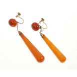 Pair of antique 9ct gold mounted amber drop screw back earrings