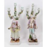 Pair of Meissen style porcelain figural candlesticks