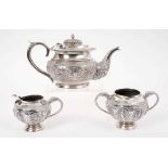 Late 19th century Anglo-Indian white metal three piece tea set