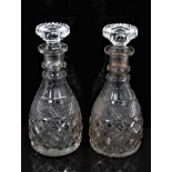 A pair of 19th century two-ring cut glass decanters with mushroom stoppers, 28cm high