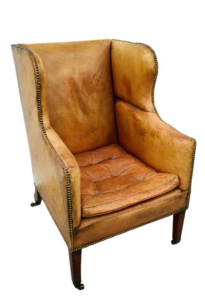 19th century leather upholstered wing armchair