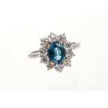 Diamond and blue topaz cluster ring