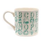 Eric Ravilious for Wedgwood, an alphabet mug in green on a cream ground, 8.5cm high