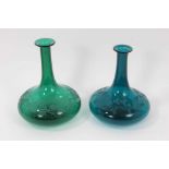 Two similar 19th century green tinted glass decanters, with etched foliate patterns, 19.5cm and 21cm