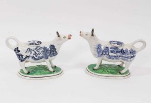 A pair of 19th century Staffordshire pottery Willow pattern cow creamers
